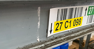 ONE2ID cleaning warehouse racks and floors label installation